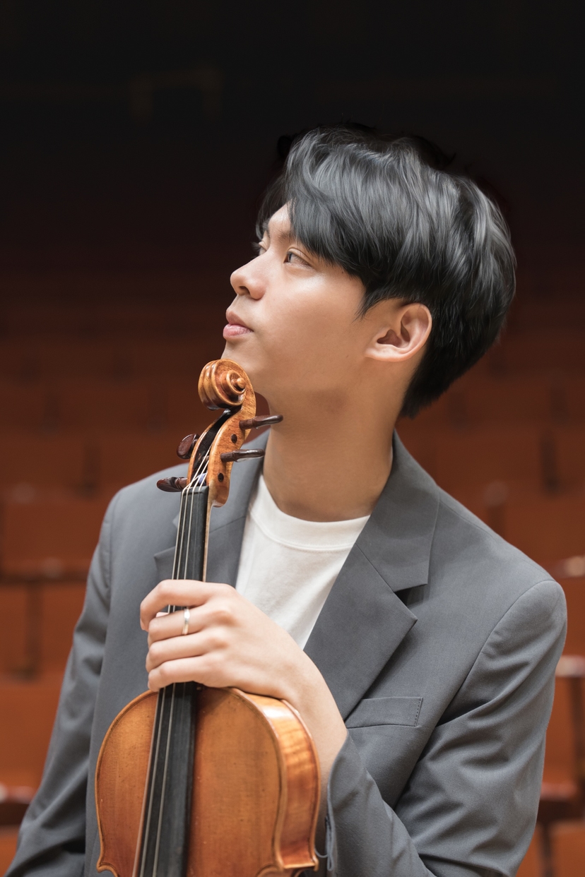 Jason holding viola looking to distance